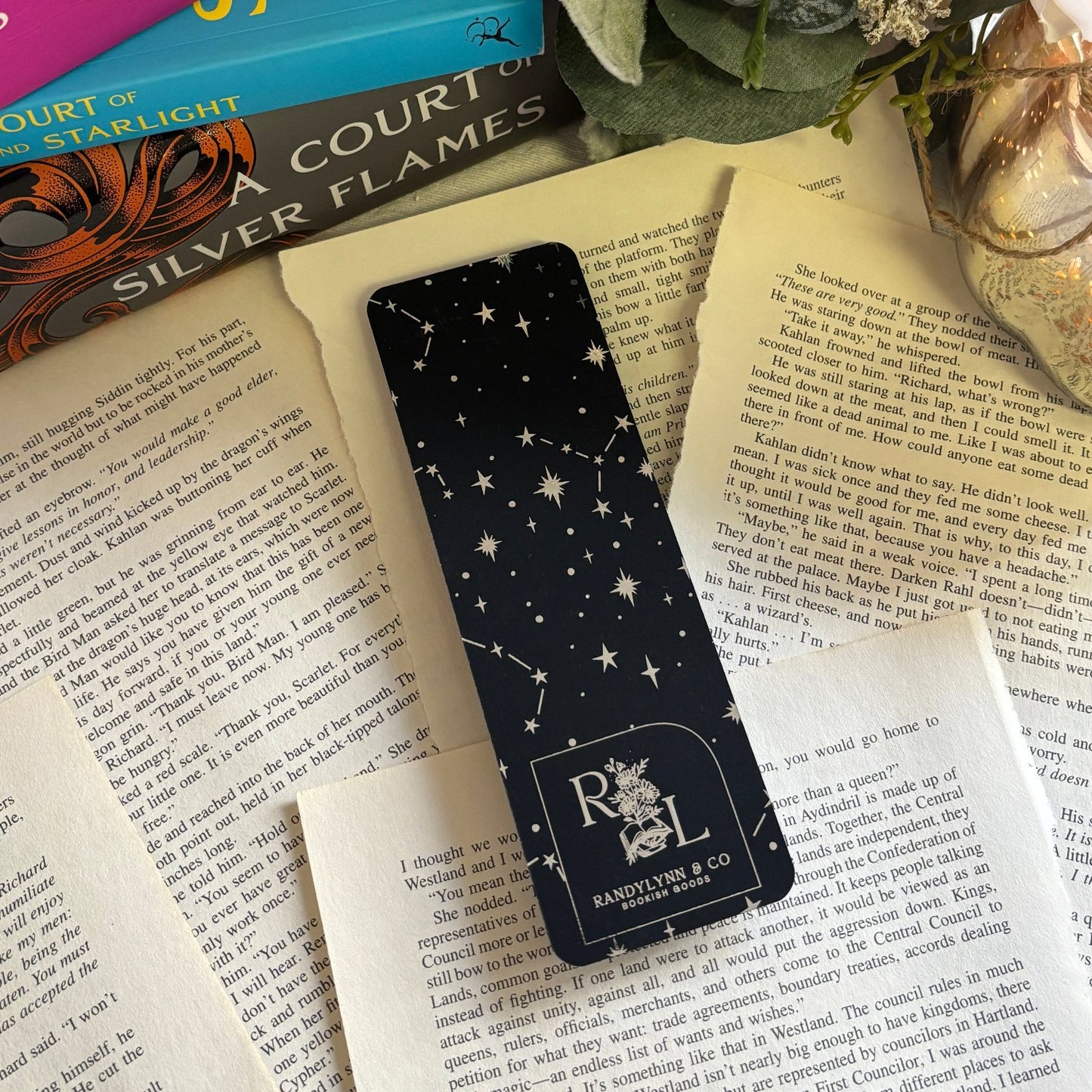 backside of bookmark is laid out on loose book pages