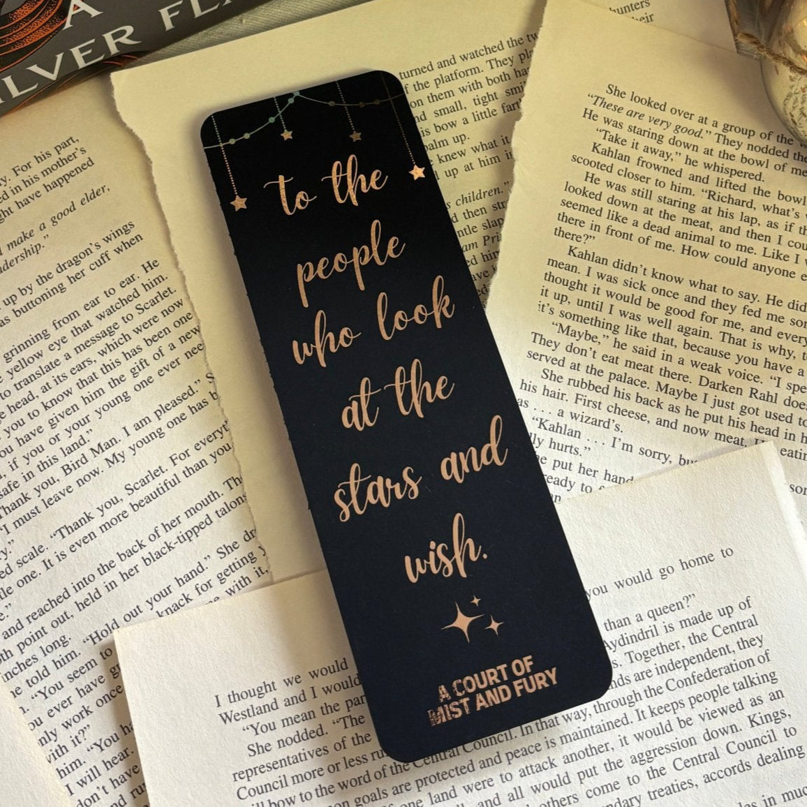 bookmark laid out on loose book pages