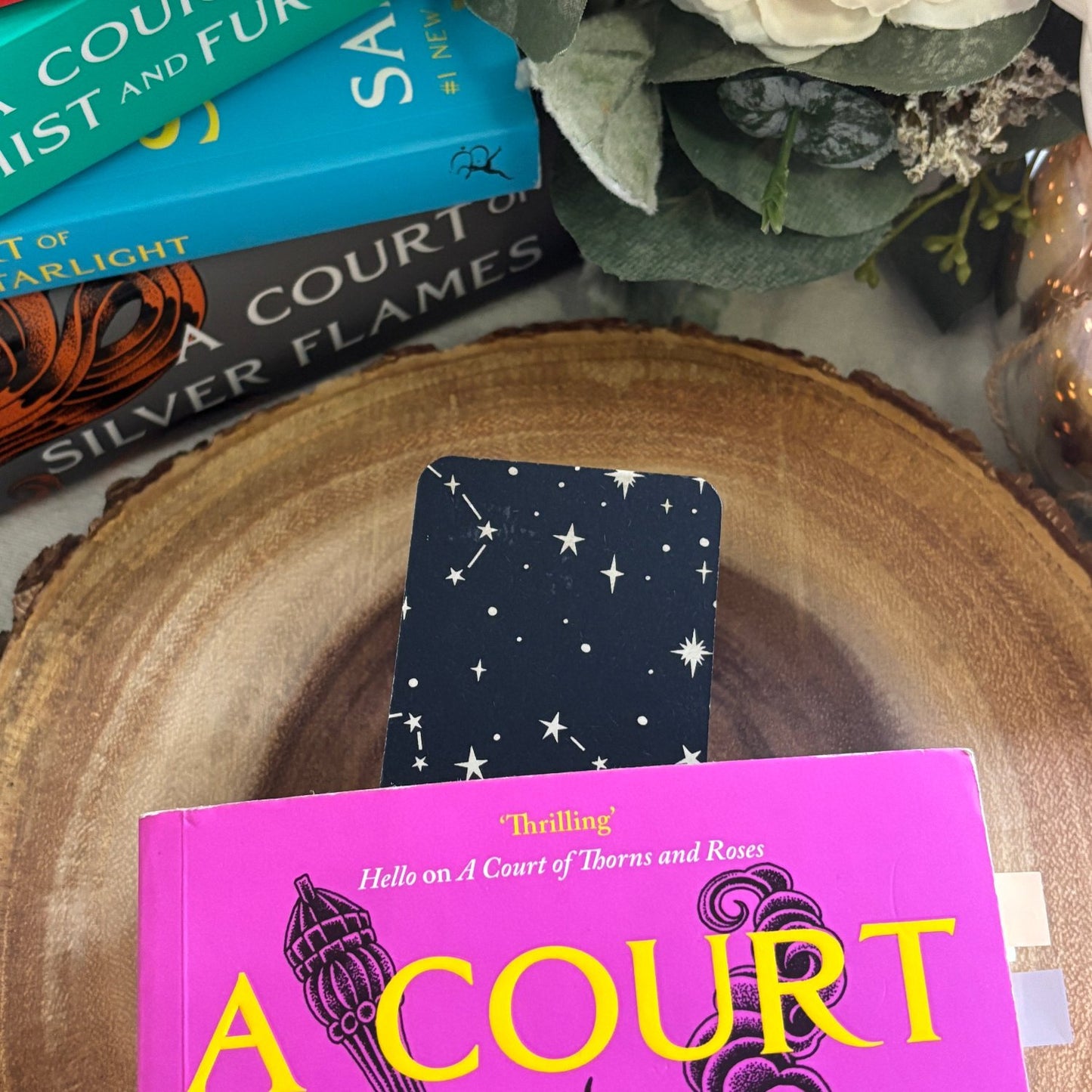 backside of bookmark is peaking out of closed book