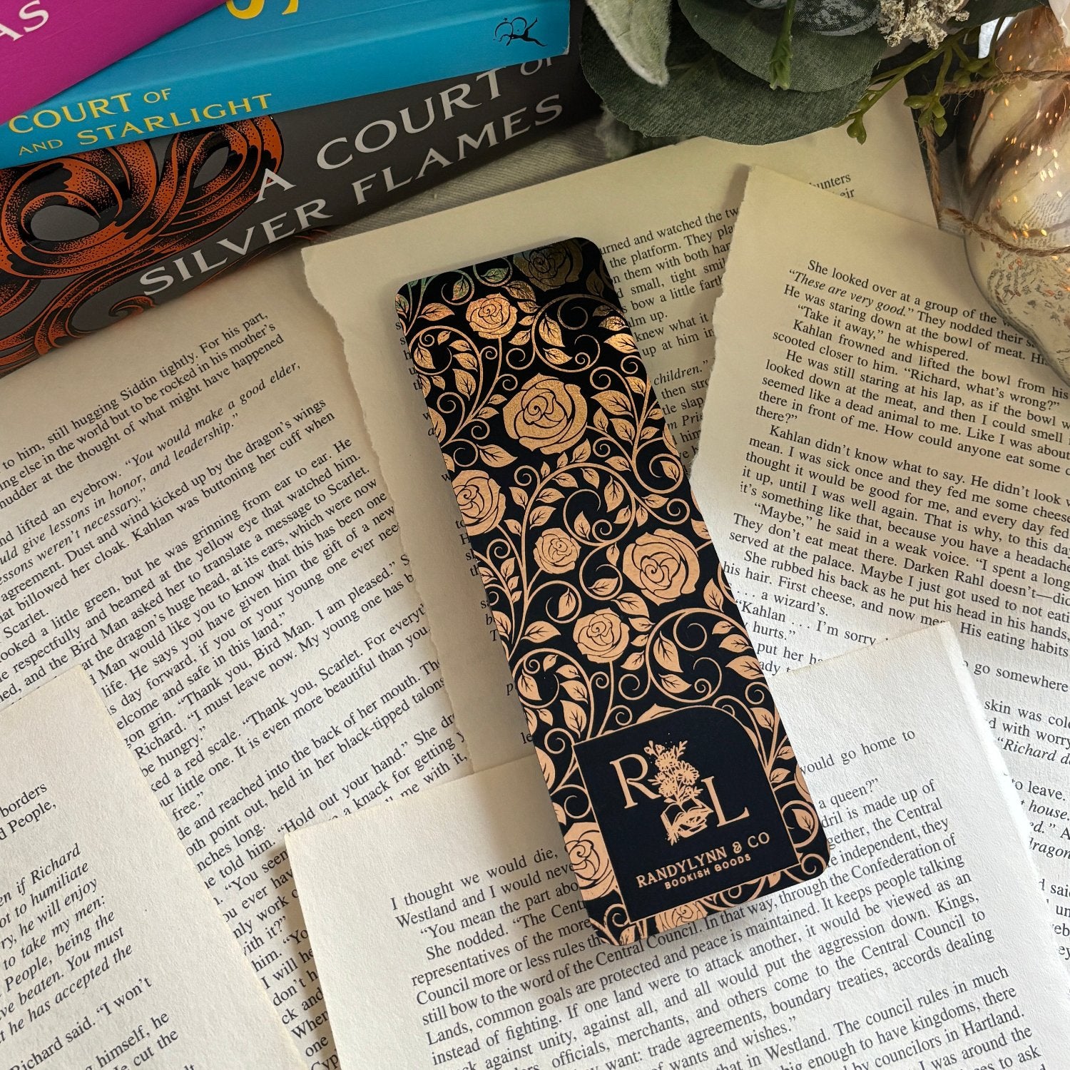 backside of bookmark is laid out on loose book pages