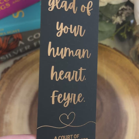 video showing the sheen of the rose gold foil. displays the front and back of the bookmark